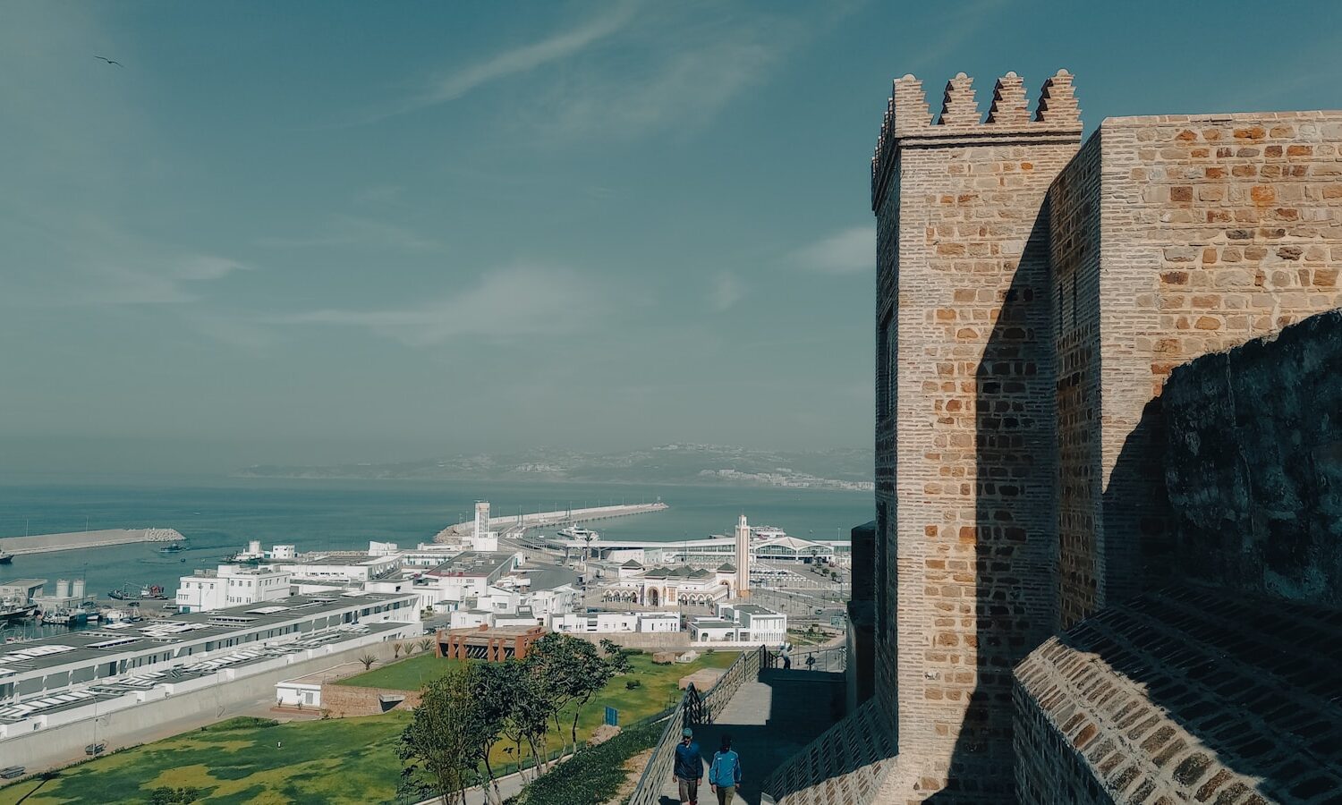a large stone tower overlooking a city