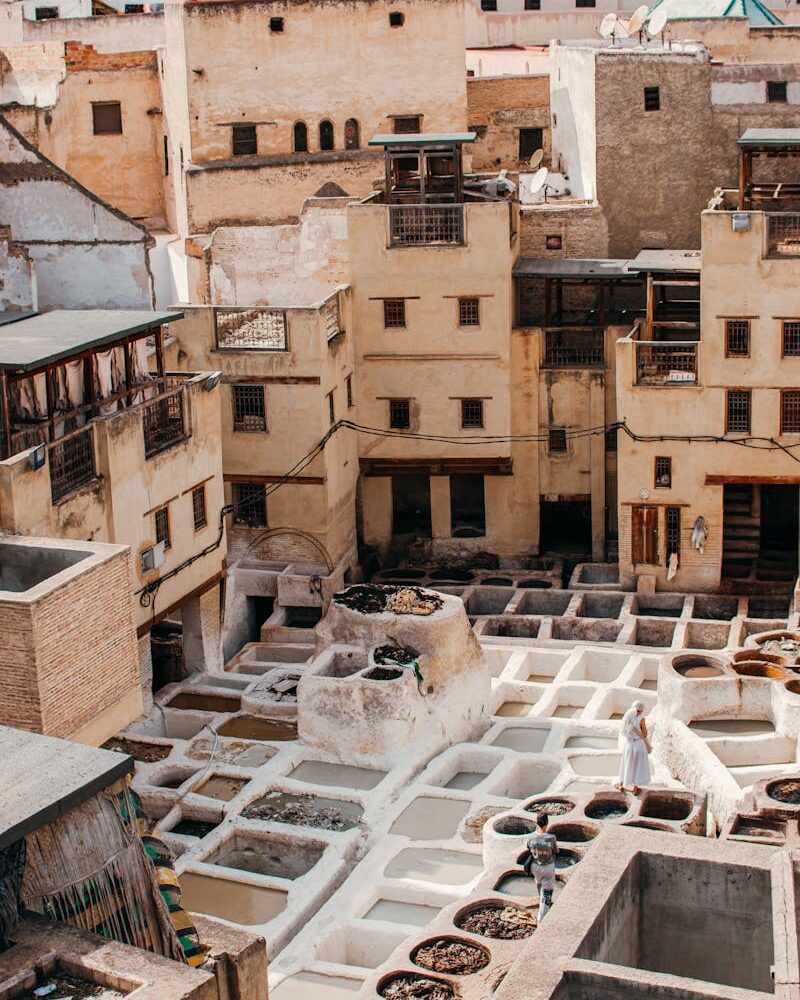 Aerial view of Chouara Tannery in Fes, showcasing traditional Moroccan architecture.