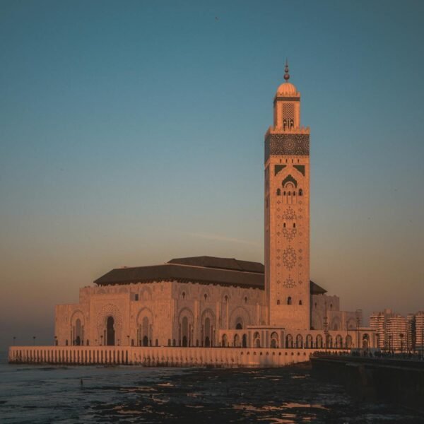 Stunning view of Hassan II Mosque against the sunset sky in Casablanca, Morocco itinerary from casablanca